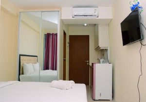 Minimalist and Fully Furnished Studio Tifolia Apartment By Travelio