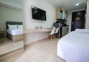 Minimalist Studio Menteng Park Apartment By Travelio