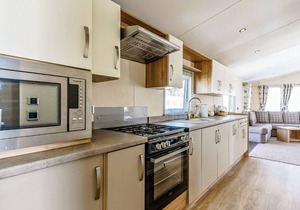 Modern and contemporary 12ft-wide caravan with two twin.