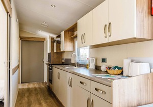 Modern and contemporary 12ft-wide caravan with two twin.