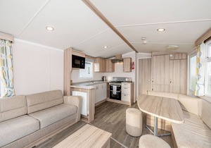 Modern and spacious 12ft-wide caravan with one double and two twin.