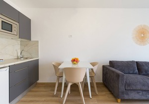 Modern apartment. Swimming pool and terrace. Right on the beach in Corralejo - Home For Guest