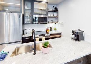 Modern condo with high-speed WiFi, wood-burning fireplace, & private W/D