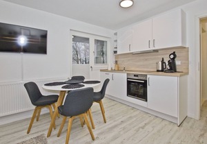 Modern vacation apartment with fireplace, balcony - Ferienresidenz Zwei Bodden FeWo111