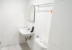 New Furnished & Modern @ Studio Tamansari Mahogany Karawang Apartment By Travelio