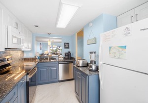 Newly Renovated! Pool View and Short Walk to the Beach