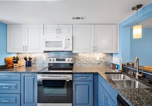 Newly Renovated! Pool View and Short Walk to the Beach