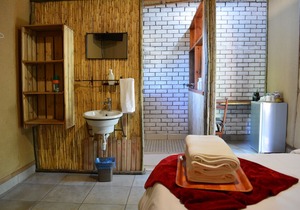 Nxabii Cottages: Cottage 1 (Standard Cottage)