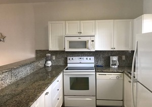 Ocean View , steps from the private beach 2 Bedroom Condo Up to 6 guests