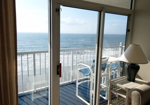 Oceanfront Corner Unit with sweeping views of beach and ocean!