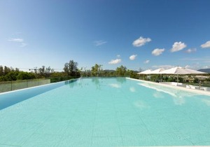 Oceanstone by Holy Cow, studio, next building view