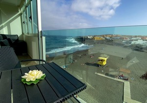 On the beach with unbeatable views
