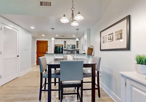 Open and attractive condo near beach with shared pool & hot tub