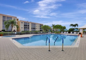 Peaceful, west-facing condo w/ hot tub, heated pool & brief walk to beach