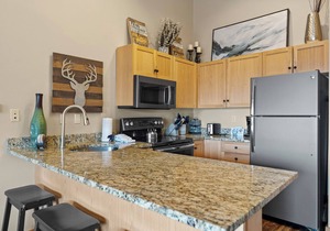 Penthouse Condo in River Run Village with Mountain Views from Private Balcony