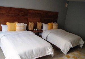 Preciosa habitación con 2 camas matrimoniales en el centro de Mérida.