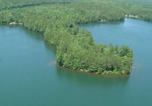 Private Lakefront home on Peninsula of Pristine Big Bass Lake