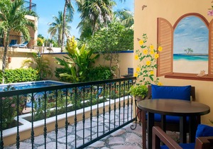 Private patio overlooking the pool. 2-minute stroll to the beach.