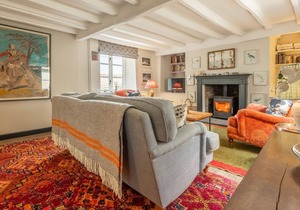 Put your feet up in front of the cosy wood burner in this lovely character cottage, and you will fee