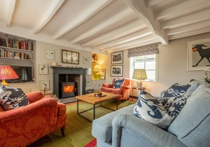 Put your feet up in front of the cosy wood burner in this lovely character cottage, and you will fee