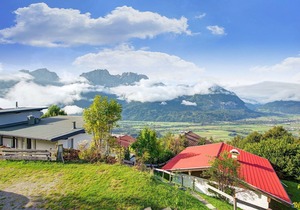 Quaint Chalet with Garden, Terrace, Fireplace,Play Equipment