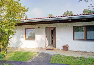 Quaint Chalet with Garden, Terrace, Fireplace,Play Equipment