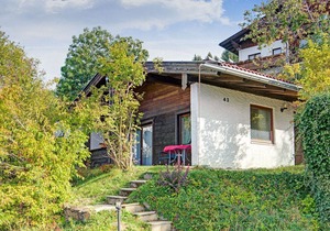 Quaint Chalet with Garden, Terrace, Fireplace,Play Equipment