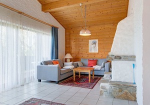 Quaint Chalet with Garden, Terrace, Fireplace,Play Equipment
