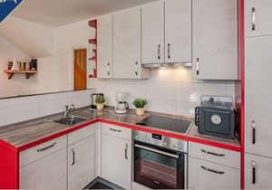 Quietly located semi-detached house with sauna and terrace with beach chair - forest settlement