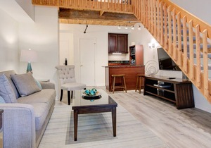 Recently updated, modern lodge room with open loft bedroom.