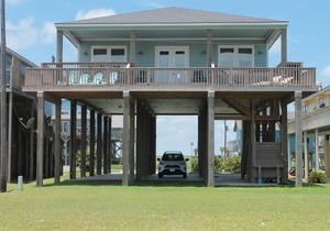 Relax and enjoy water views of the Gulf and beautiful home so near the beach!