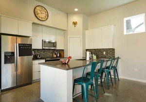 Relax in this huge East Austin home with a private patio & studio suite!