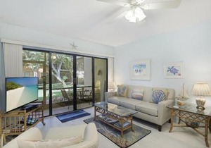 Relaxing condo with two pools and steps to beach