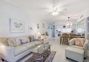 Relaxing condo with two pools and steps to beach