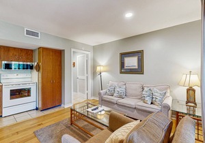 Renovated lagoon-view condo with screened porch & WiFi - steps from the beach