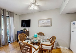 Renovated lagoon-view condo with screened porch & WiFi - steps from the beach