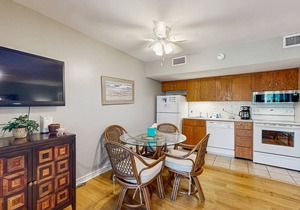 Renovated lagoon-view condo with screened porch & WiFi - steps from the beach