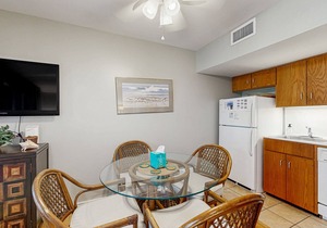 Renovated lagoon-view condo with screened porch & WiFi - steps from the beach