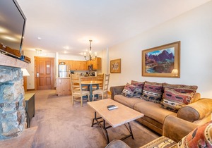 River Run Condo with Spacial Balcony overlooking Ice Rink & Mountain Views!