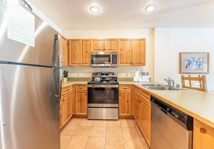 River Run Condo with Spacial Balcony overlooking Ice Rink & Mountain Views!