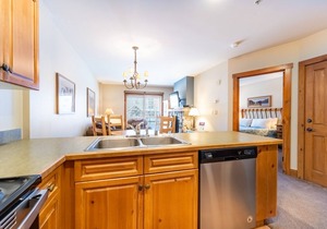 River Run Condo with Spacial Balcony overlooking Ice Rink & Mountain Views!