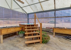 Riverside cabin with shared hot tubs, nearby skiing, fishing, and much more!