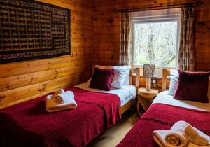 Self-Catering log cabin near Plockton and the Isle of Skye secluded, well equipped and dog friendly.