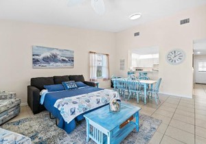 Serene Seaside Retreat - Dog friendly - 2BR Townhouse with Shared Heated Pool Steps to Paradise Beach!
