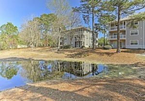 Southport Resort Condo with Balcony Pool and Beach Access