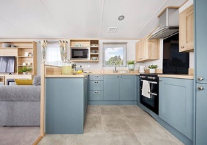 Spacious and modern 12ft-wide caravan with one double and two twin.