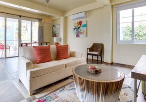 Spacious Condo w/ Kitchen, WiFi, & Balcony - Steps to Beach, Dining, & Shops