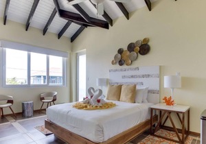 Spacious Condo w/ Kitchen, Balcony, & WiFi - Steps to Beach, Dining, & Shops