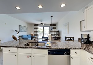 Spacious condo w. pool views + private beach access