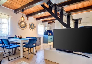 Spend a carefree vacation in this modern furnished vacation home with pool.